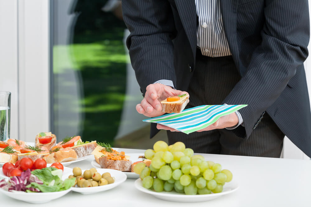 business-lunch-and-businessman-holding-colorful-snack